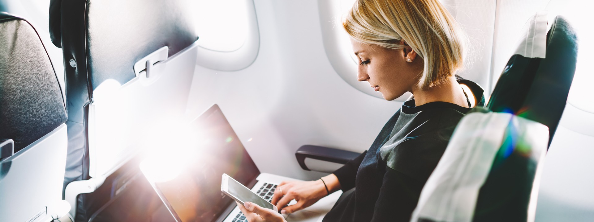 woman sat on plane