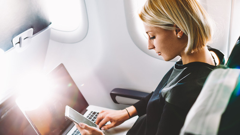 woman sat on plane