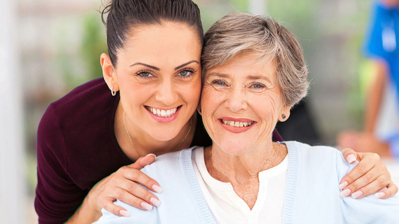 elder-care-800x450 Closeup portrait of a daughter embracing her mother.