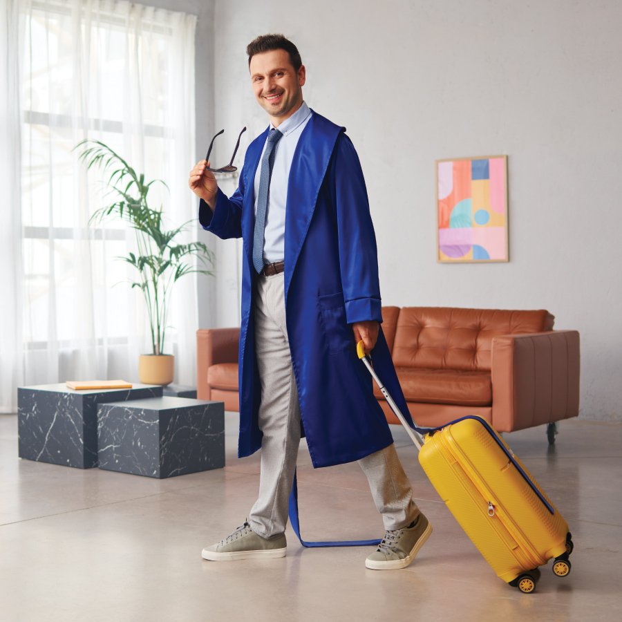 Man pulling suitcase