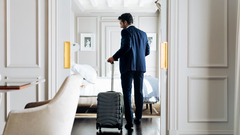 man in hotel room